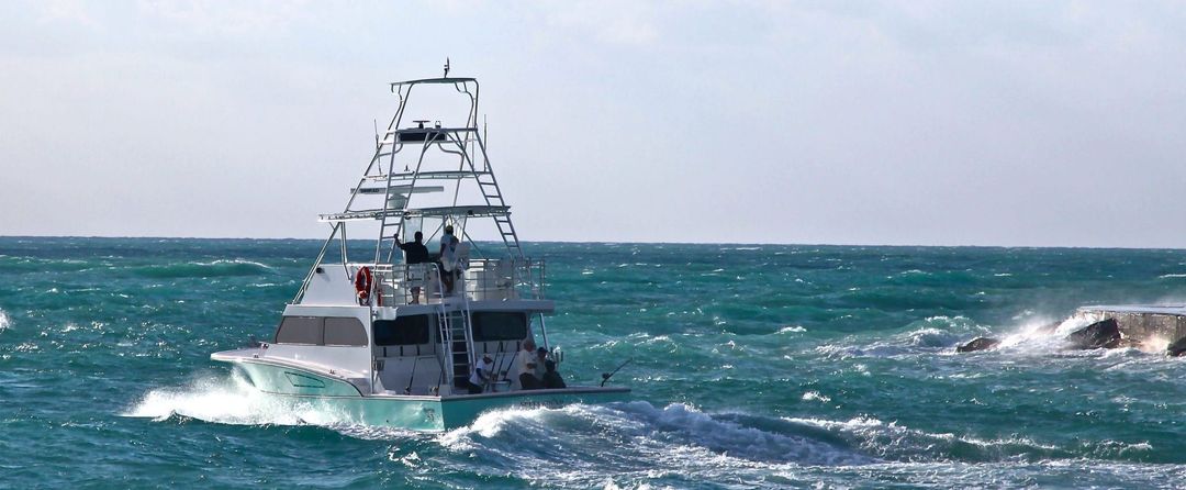 The 57-foot Spellbound running through choppy seas off Miami
